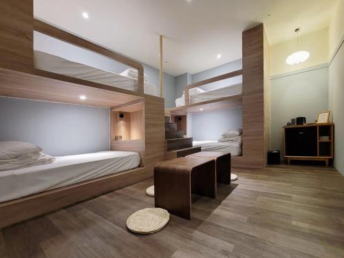 Ένα ή περισσότερα κρεβάτια σε δωμάτιο στο Green Hotel - Midori