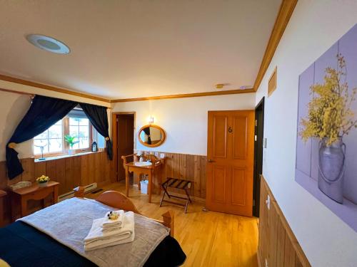 Katil atau katil-katil dalam bilik di Auberge au Poste de Traite
