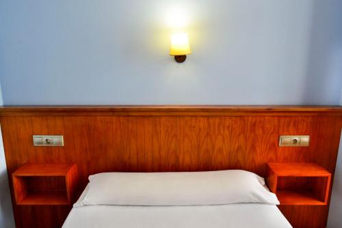 Postel nebo postele na pokoji v ubytování Alda Vía de la Plata Rooms