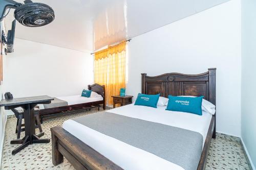 Posteľ alebo postele v izbe v ubytovaní Ayenda Bariloche La 22