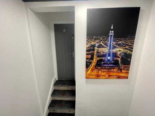 a picture of the eiffel tower on a wall at Osborne hot tub and jacuzzi suites in Blackpool