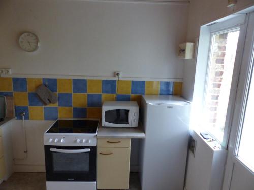 Η κουζίνα ή μικρή κουζίνα στο Duplex 4 personnes La Calypso