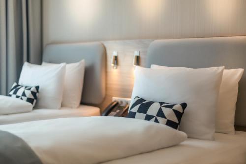 Postel nebo postele na pokoji v ubytování Holiday Inn Express - Erlangen by IHG