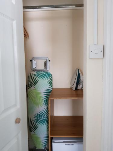 a room with a vase in a closet at Seamore Guest House in Great Yarmouth