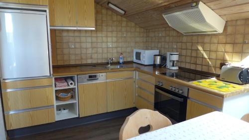 Kuchyň nebo kuchyňský kout v ubytování Ferienwohnung Hein