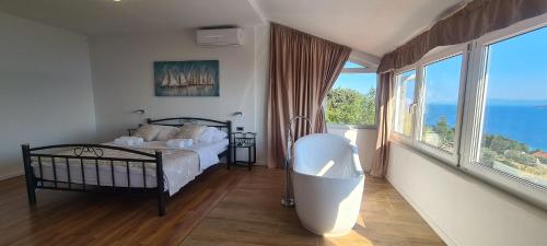 Posteľ alebo postele v izbe v ubytovaní Villa Dream come true