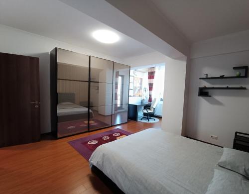Photo de la galerie de l'établissement Aria Premium Apartment, à Bucarest