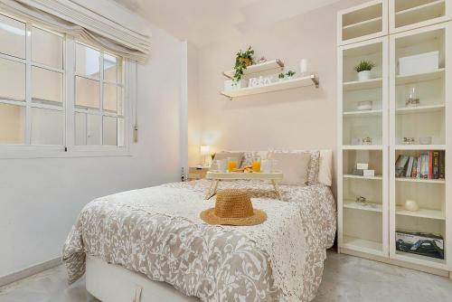 Ένα ή περισσότερα κρεβάτια σε δωμάτιο στο Apartamento a 1 minuto de la playa