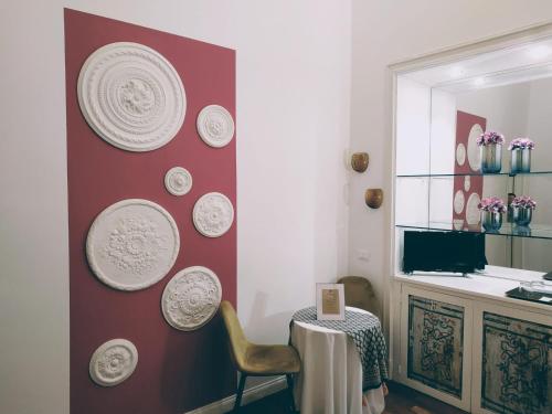 TV a/nebo společenská místnost v ubytování Il Rosone Luxury B&B
