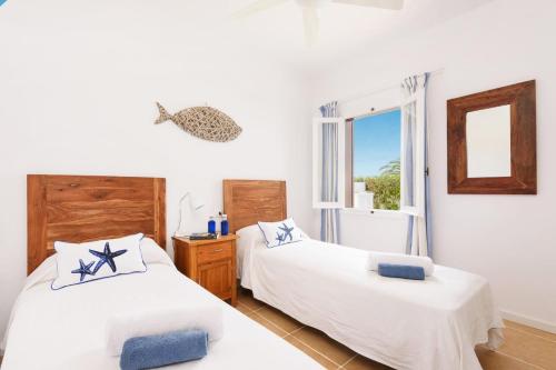 Ένα ή περισσότερα κρεβάτια σε δωμάτιο στο Villa Carpe Diem by Villa Plus