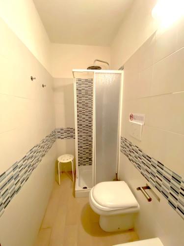 a bathroom with a toilet and a shower at Bed & Breakfast La Rocca in Taormina
