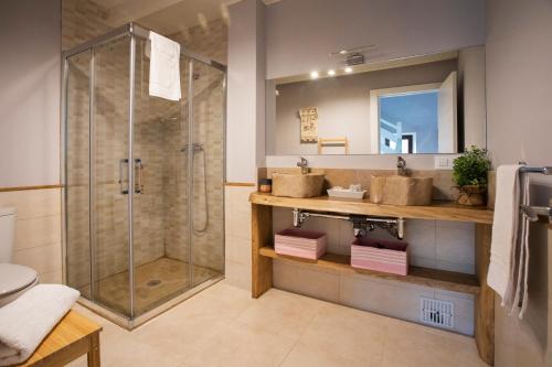 a bathroom with a shower and a sink at Casa de campo en Llanes para 8 personas in La Galguera