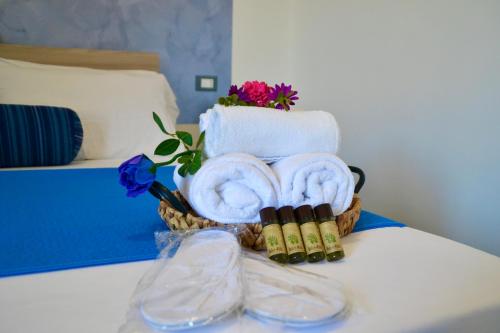 Postel nebo postele na pokoji v ubytování Sperlonga Paradise Suites 500m dal mare in estate Servizio navetta per Sperlonga centro