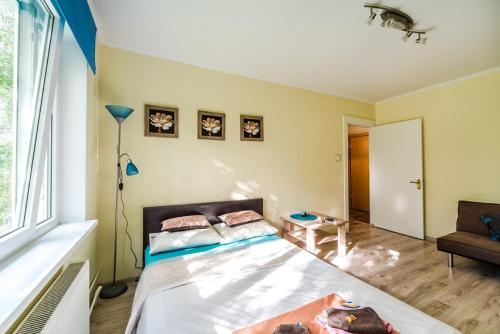 Кровать или кровати в номере Nice Apartment in Riga Suburbs