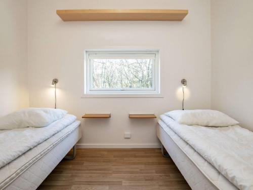 Postel nebo postele na pokoji v ubytování Holiday home Vestervig XXXII