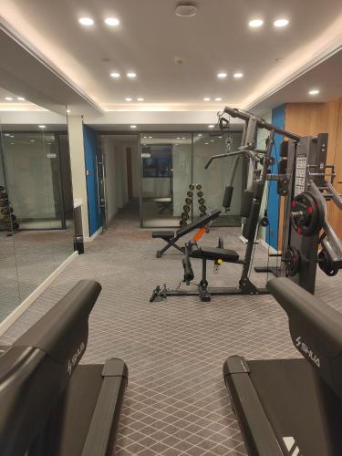 a gym with cardio equipment in a hotel room at Holiday Inn Express Quanzhou City Center by IHG in Quanzhou