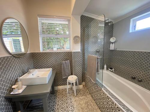Ванна кімната в Walmer Cottage - Cute & Pet friendly