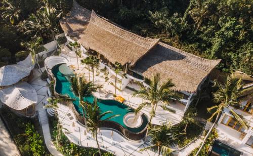 an aerial view of a resort with a swimming pool at Neano Escape in Candidasa