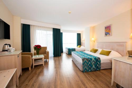 Ένα ή περισσότερα κρεβάτια σε δωμάτιο στο Side Star Park Hotel - All Inclusive
