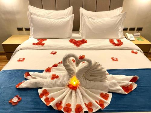 Ένα ή περισσότερα κρεβάτια σε δωμάτιο στο Bravo Tanauan Hotel