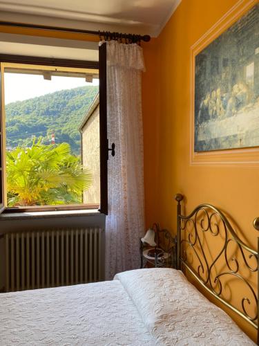 Un pat sau paturi într-o cameră la B&B Azalea