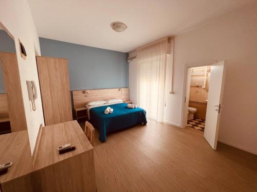 Postel nebo postele na pokoji v ubytování Hotel Damma's, Dipendenza Zamagna