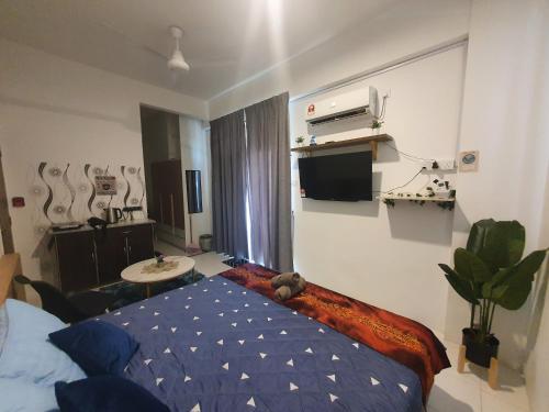 Ein Bett oder Betten in einem Zimmer der Unterkunft ALOR SETAR IMPERIO PROFESSIONAL SUITE by Zenith Smart