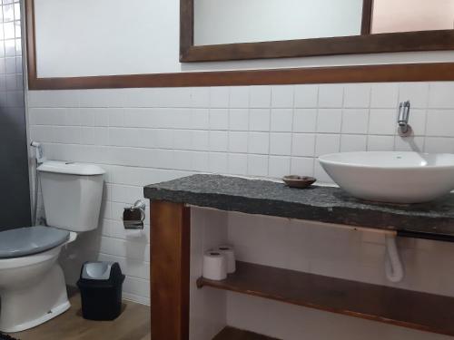 a bathroom with a sink and a toilet at Buzios Casa n# 2 in Búzios