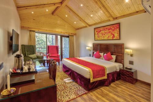En eller flere senge i et værelse på Span Resort and Spa