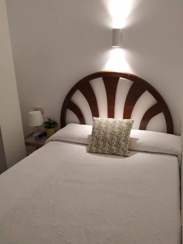 Ένα ή περισσότερα κρεβάτια σε δωμάτιο στο Hostal Abitum Madrid