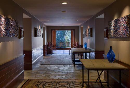 a hallway with tables and chairs in a building at Hyatt Regency Lake Tahoe Resort, Spa & Casino in Incline Village