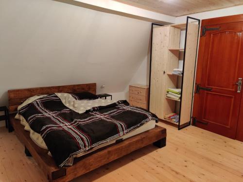 Postel nebo postele na pokoji v ubytování EKO KUĆA HEDONIJA