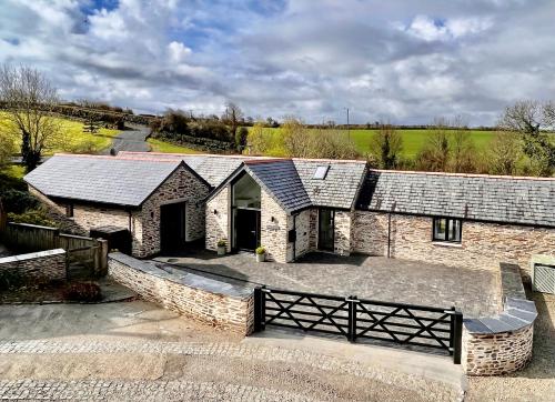 an overhead view of a stone house with a fence at Gwel an Heyl, Padstow in Little Petherick