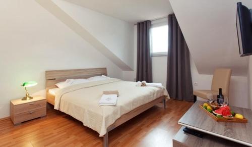 Cama o camas de una habitación en Ida Apartments