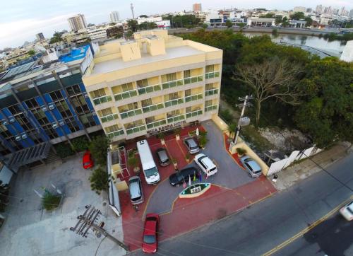 an overhead view of a parking lot in front of a building at Ibiza Barra Hotel in Rio de Janeiro