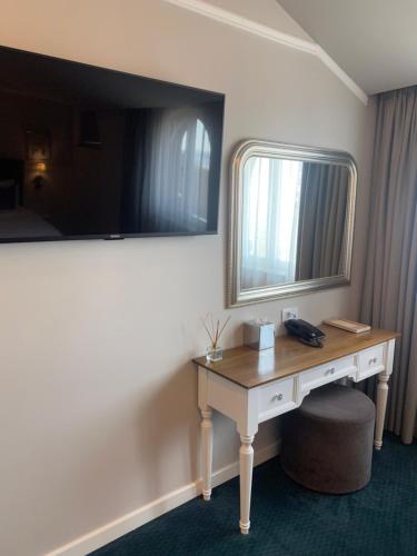 Hotel Residence Promenadeにあるテレビまたはエンターテインメントセンター