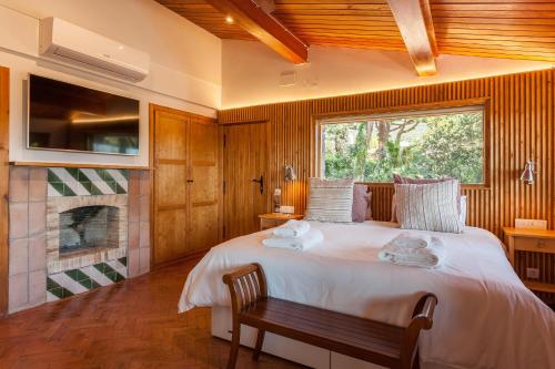 Ένα ή περισσότερα κρεβάτια σε δωμάτιο στο Villa Barcelona Country House