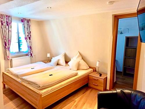 Ένα ή περισσότερα κρεβάτια σε δωμάτιο στο Hotel Gute Quelle