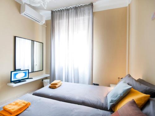 A bed or beds in a room at UR-NEST Borgo