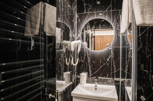 Koupelna v ubytování Hotel Carpe Diem