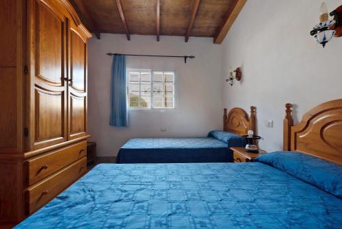 Postel nebo postele na pokoji v ubytování Casa El Cardon A1