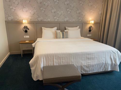 Hotel Residence Promenadeにあるベッド