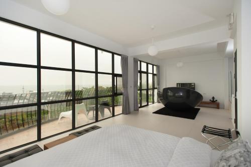 Voodi või voodid majutusasutuse Discovery B&B toas
