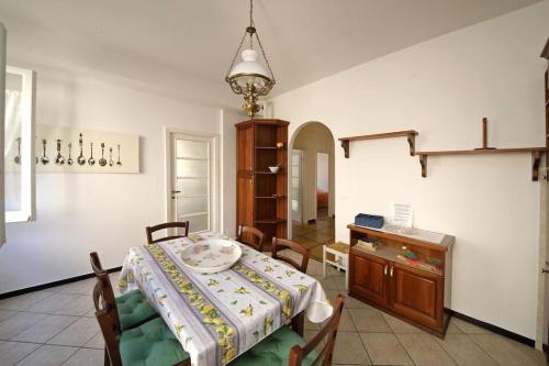 a dining room with a table and some chairs at AL PORTO DI SANTA in Santa Margherita Ligure