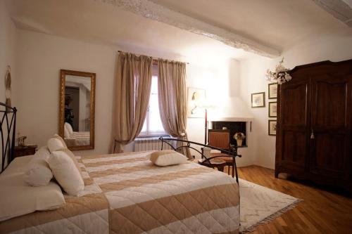 Tempat tidur dalam kamar di Affittacamere Cinzia