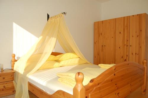 Cama o camas de una habitación en Ferienwohnung Maks und Kris