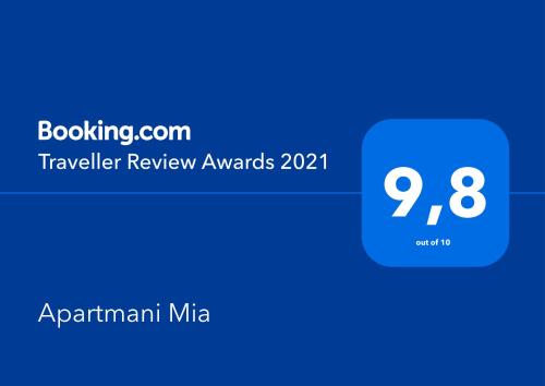 a blue box with the text travel review awards at Apartmani Mia in Zambratija