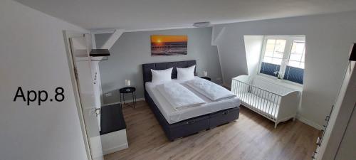 Posteľ alebo postele v izbe v ubytovaní Altstadt Appartements