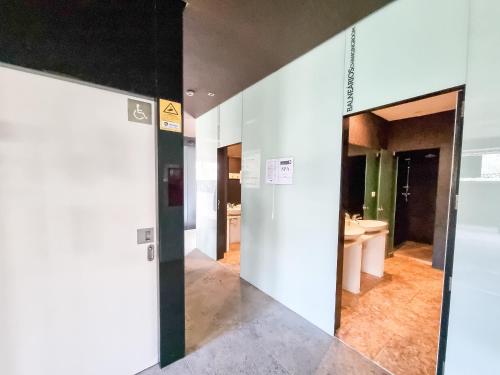 an elevator lobby with a mirror in a building at Foz Palace Spa Luxury Residence in Portimão