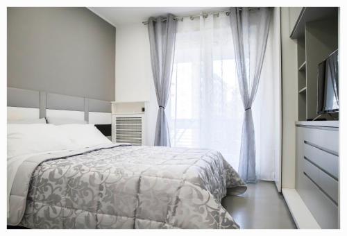 Posteľ alebo postele v izbe v ubytovaní New Sara's Trastevere apartment